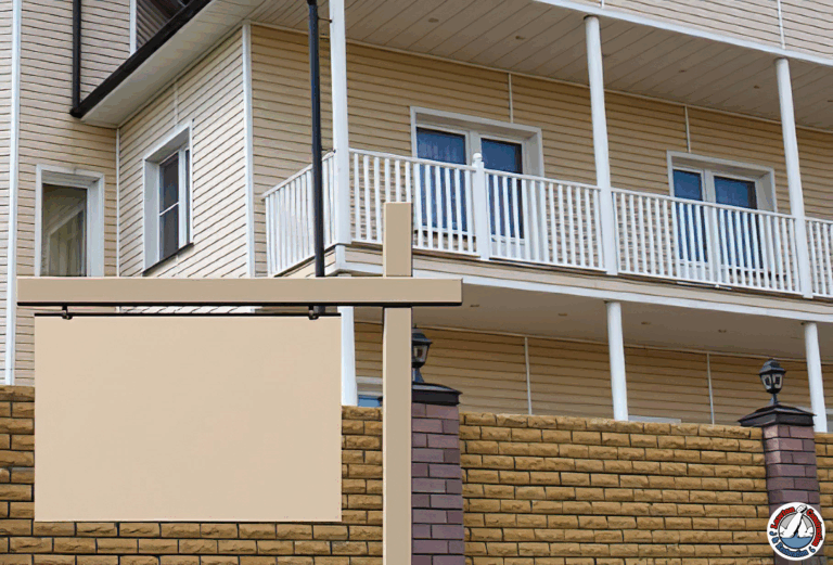 Fire-damaged home secured with professional board up and signage