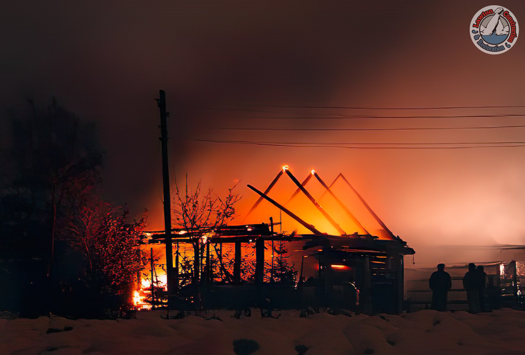 Residential property with severe fire damage showing burnt walls and debris