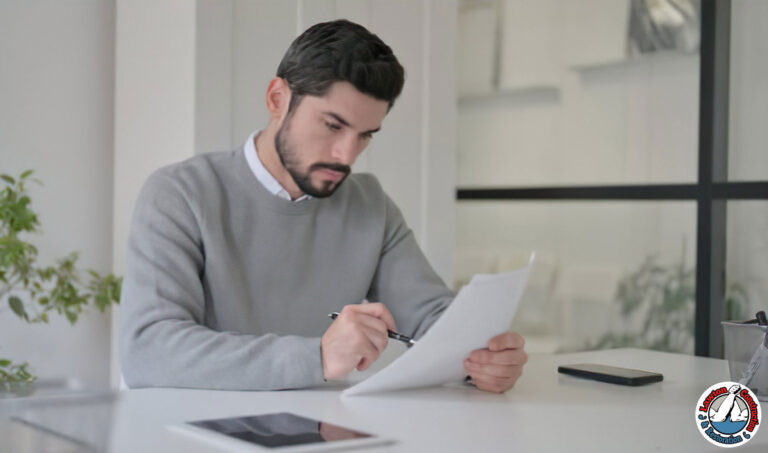 Homeowner reviewing mold remediation insurance policy documents