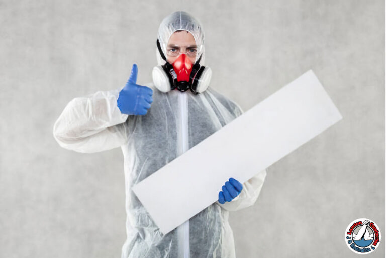 Certified asbestos contractor inspecting ceiling insulation