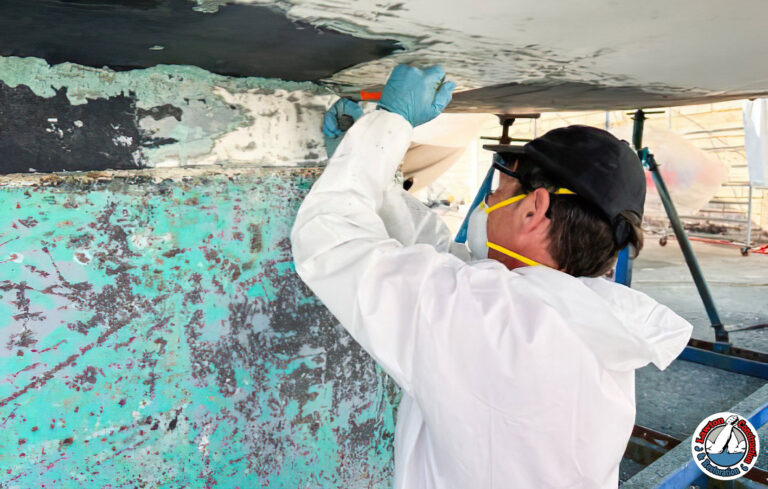 Certified professional performing safe lead paint removal
