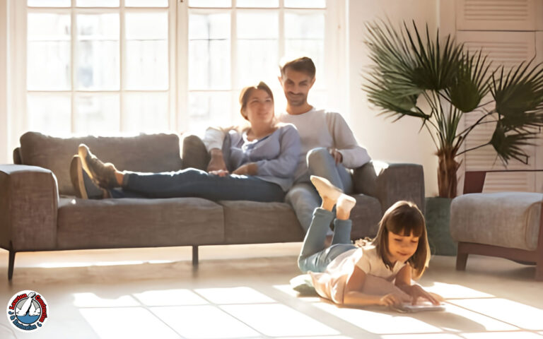 Happy family relaxing in a bright, renovated lead-free home
