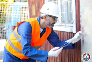 Certified lead removal professional conducting a lead inspection in a residential home